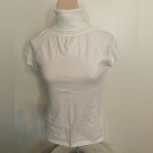Elegant Off White Turtleneck Top
Item# TSsw38